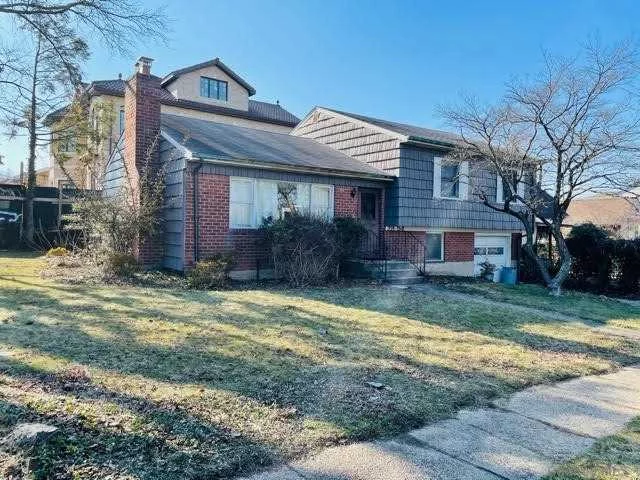 Detached Split Level Home For Sale On Oversized 66x100 - making this3 br/2 bath home with basement and family room, laundry room, garage and large stone floor porch priced right for a refresh/renovation - or even an all new much larger home of your dreams!Minutes from Manhattan this home is right near the 216 st. entrance to Crocheron Park with tennis courts, baseball fields and miles of bike and running paths. Close to restaurants, shopping and transportation -Convenient overpass nearby to Bayside Marina and Little Neck Bay! Check Architect For Expansion Opportunities!