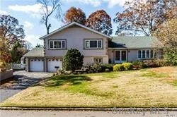 Amazing 4 level split on a beautifully manicured 1/3 acre lot in the Lakeville Estates section of East Hills. This 4 br/3.5 bath home features a spacious open-concept sun-drenched living room with 2 skylights, dining room and dinette kitchen on the main floor. Custom vaulted 10&rsquo; ceilings, fireplace and charming enclosed porch off the LR are some of the features that make this home special. Top-of-the line materials and quality finishes throughout add to the design appeal of this home. The walk-in level features a spacious den with sliders to a beautiful patio and there&rsquo;s a bedroom on this level that can be just the home office Necessary for work/homeschool needs! Village Taxes Include Use Of Town Recreational Facilities