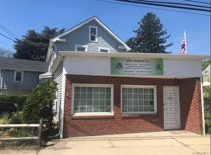 Three room office in mixed use building on main road across from busy shopping center with great signage. Reception area, private office, 2nd office with powder room.  Open style clean basement for storage.  Two parking spaces, one on Glen Cove Ave, one on Franklin in driveway, along with street parking.