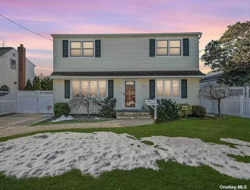 This Beautiful 4 Bedroom/ 2 Bath Colonial with Neutral Decor. Highlights Include: Gourmet Kitchen w/ Island, Pantry & Granite Countertops, New Boiler, New Oil Tank, 200AMP Service, Mid Block, Fully Fenced, Convenient To All (Shopping, Parkways, Parks, Schools)