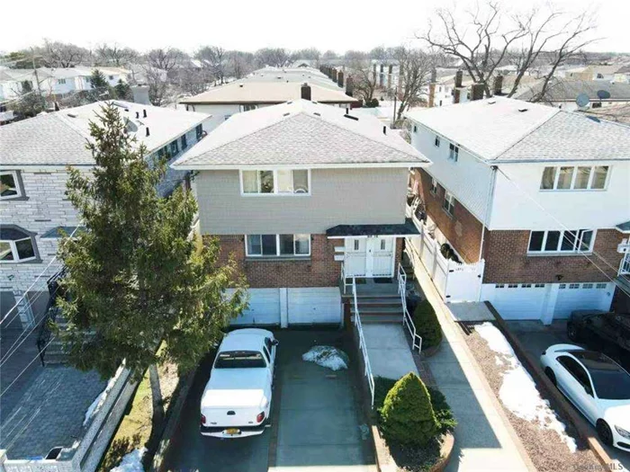 Howard Beach 6-bedroom and 4-baths detached two-family house on 3, 999 Sf lot. Features 1st and 2nd floor each with 1, 250 SF and 3 bedrooms+2 baths, newly finished full basement w/separate outside entrance, 2-car attached garage, big backyard, 2 gas meters, 3 electric meters. Located near supermarkets, restaurants, banks, pharmacies and more. Minutes from Cross Bay Blvd,  J.F.K airport. Q-21/41 bus stops. Belt Parkway Exit 17.