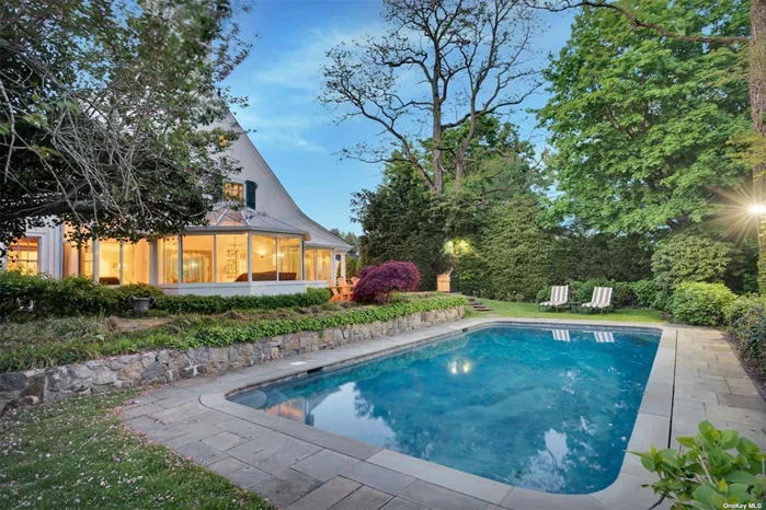 Situated on Almost 2 Acres of Lush Landscape with Pool, Har Tru Tennis Court, Spa, Outdoor Shower & Cabana Bath Sits this Magnificent 4 BR; 5.5 Bth Home Dating Back to the Mid 1800&rsquo;s. Originally Part of the Morgan Estate, Sitting at One of the Highest Points in Old Westbury, this One-of-a-Kind Colonial Boasts Breathtaking Views. Featuring Over-Sized LR & DR w/Two Gas Fireplaces & Add&rsquo;l Sitting Areas. Spacious EIK, Accessible from Outdoor Sanctuary Provides an Abundance of Space to Entertain and Enjoy. Recently Updated Sunroom Overlooks this Spectacular Property. Second Story Master Suite Inc Large Walk-In Closet/Sitting Room & Add&rsquo;l Well Purposed Closet Space. The Second Floor Also Includes a Spacious Main Sitting Area & 2 Add&rsquo;l Beds & Full Bath. Open-Aired Third Level Offers Bonus Space With Full Bath. Finally, Let&rsquo;s Not Forget the Historic Charm from the Original 660 Acre Estate. Jericho SD