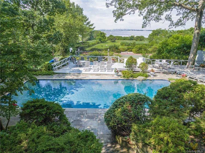 One of a kind waterfront property featuring a slice of sandy beach, stunning views of the NYC skyline plus your own PRIVATE DOCK. Set on shy of 3 acres, with pool and tennis court,  this expansive, sunlit contemporary home is waiting for you to make it your own. Surrounded by spectacular estates Cedar Knoll is truly one of Sands Point&rsquo;s premiere addresses. Being sold as is.