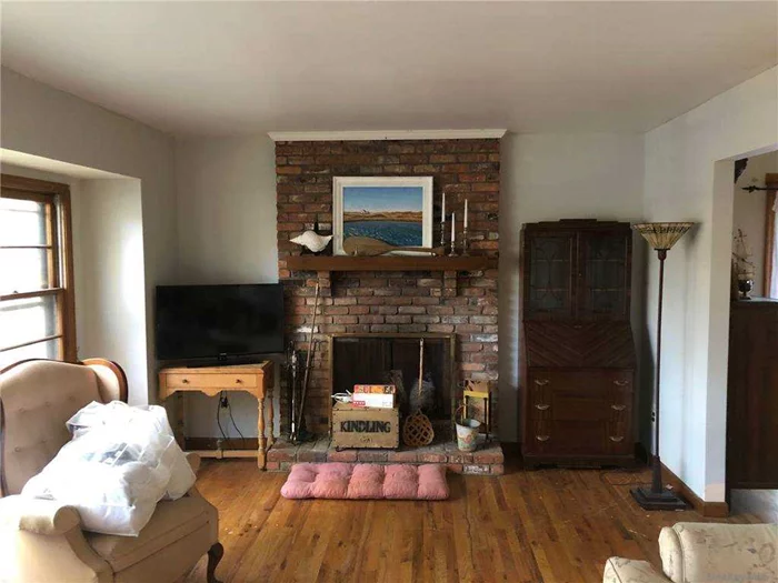 Living Room with Wood Buring Fireplace