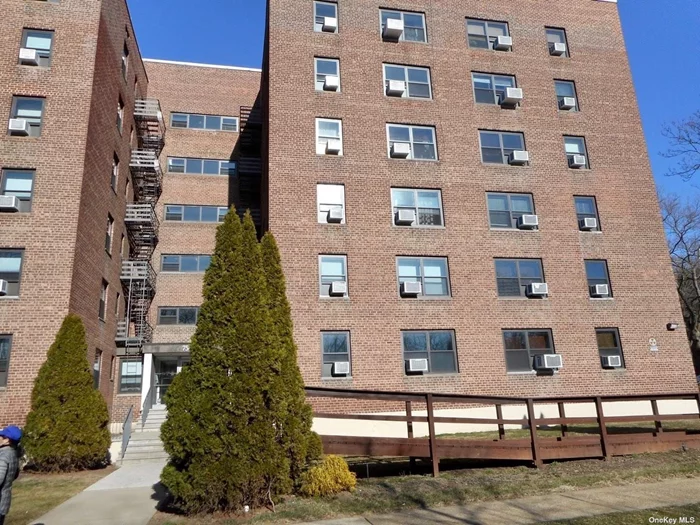 Best price! Large 2 bedrooms coop in Windsor Park, building next to park like open area and next to alley pond walkway!Low maintenance only $740. Assigned outdoor parking space available no waiting/$75 per month. Top school district. PS205 and MS74, walk to buses, shopping. Won&rsquo;t last! Call for private showing.