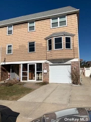 Brand New Triplex W/Garage Near Bay Terrace Shopping Center Area of Bayside 3 Levels Living Space Over 2000 Sf.Hard Wood Floors throughout.3 Bedrooms , Office 3 full Baths, Lower level has a family room and wet bar .Easy Access to All Transportation, LIRR To Penn Express Bus to Manhattan, Fenced Back Yard.Great location, Walk To Fort Totten Park by the Water.