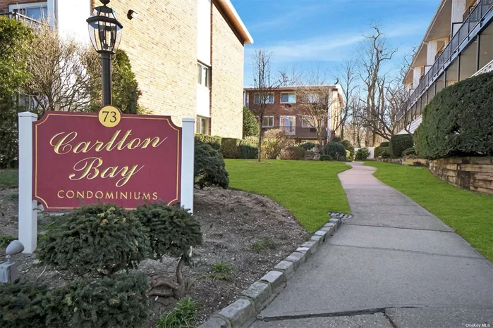 A must see sun-filled, spacious and updated 2 bedroom duplex with a lovely balcony overlooking the park. Freshly painted, beautiful hardwood floors and abundant closets throughout. Convenient to town, train and parks. Community salt water pool, assigned garage space, low taxes and maintenance.