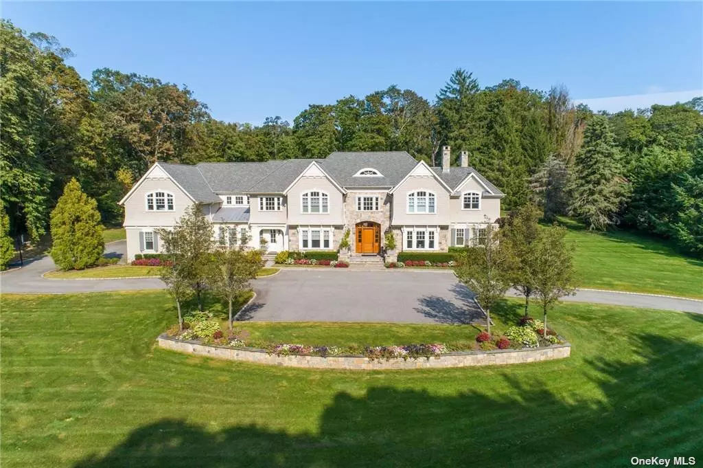 Built in 2011 by the Worrell Group, this stunning residence is perfectly placed on 2.56 acres and is located within a private cul-de-sac off of Moores Hill Rd. The dramatic two story entryway welcomes you into this custom built house featuring incredible millwork throughout. There is an open gourmet eat in kitchen with large island, beautiful library/office, spacious great room with fireplace, oversized dining room and formal living room with fireplace. Magnificent master suite with fireplace, sitting room and spa bathroom, 4 ensuite bedrooms embody the second floor, finished off with a play room. Spectacular lower level with game room, gym, bar, theater and 1/2 bath. Attached 4 car garage. CSH #2 SD. Laurel Hollow beach , mooring and dock