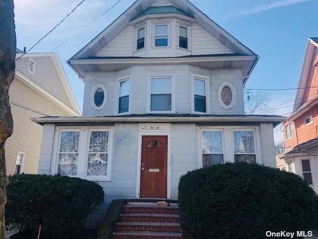 One of a kind Victorian in Woodhaven N. Detached with nice size yard. First floor has enc. Porch, 3 bedrooms, LR, EIK, Full Bathroom - Sep entrance. 2 and 3rd floors have Sep entrance - 2 staircases,  EIK, 2 Full Baths, Living Room, FDR, 6 Bedrooms and Office. Bright and sunny - spacious with new windows, replaced roof. Driveway and Garage. Steps from Forest Park, Shops, J Train.