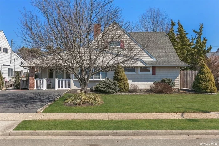 Nicely Updated and Expanded A FRAME Cape. Expanded Living room/Dining Room, Expanded Bedrooms. Updated Kitchen and Baths. 2.2 miles from Hicksville Station. Wood Fireplace. Updated, Roof, Siding, Windows, 200 Amp Electric. Nice Mid-block location. Cover Porch in Front, Covered Patio in Back.