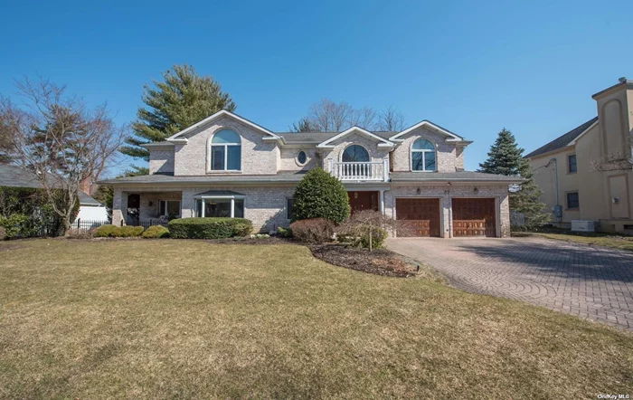 Beautiful two story entry welcomes you to this exceptional custom built 7 bedroom home. Rebuilt in 2001 with a grand living room and sitting room with French doors opening to the backyard, a banquet sized dining room and an expansive kitchen with doors to an outside covered patio. An oversized great room/den compliment the open flow with room for living, working & entertaining for today&rsquo;s extended family lifestyle. The main floor boasts one grand suite, an additional master/ guest bedroom, 3rd bedroom/office & powder room. Separate laundry room. The upper level greets you with a skylit loft, 4 bedrooms and a full bath. The lower level finished basement complete with full bath and egress windows brighten the space. Perfectly situated on a quiet block in the desirable East Williston school district. Accessible to all. highways, LIRR, shopping.