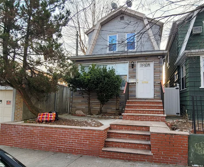 Excellent Starter Home Opportunity. Located in desirable Woodhaven, Queens. Great Price and Location.  1 Family Colonial home, Fully detached with a full finished basement. The First floor features: LR/DR, Main bedroom with large closets, Office or walk in closet space, modern and large eat in kitchen, stainless steel stove and backsplash and a full bathroom.  The second floor: 3 bedrooms and a full bathroom. Wood floors throughout. Very close to J train, main bus lines, major roadways, conveniences, shopping and entertainment.