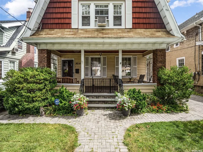 This classical spacious colonial home offers everything you are looking for. Entering the home the large living room has a wood burning fireplace making this a perfect cozy place to relax! The dining room has wood coffered ceilings and plenty of space to entertain. The kitchen has a separate outdoor access to the backyard with an adjacent powder room. The dual staircase connects the kitchen and the living room giving the new homeowner easy access to the second floor. The second level has three generously sized bedrooms with plenty of closet space with a full bath. The walkup attic consists of two bedrooms and ample storage space. Plenty of storage throughout this home! There&rsquo;s a full finished basement with a separate outside entrance from the backyard. This large 40x100 property home is 3 blocks away from the Q13 and Q31 local buses and 5 blocks away from the LIRR. Local shops, restaurants and more are a short distance away to Bell blvd. and Bay Terrace.