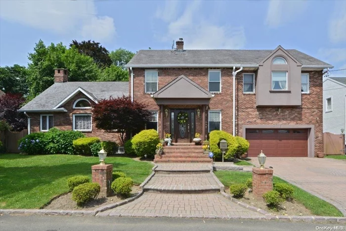 Magnificent Custom Brick Colonial Home In The Heart Of Bayside Weekswoodland Location ! Gracious Entertaining Lifestyle. Banquet Sized Family Rm With Fpl & Skylite. Fabulous In-Ground Pool With Waterfall! Outstanding Parklike 10, 950 Sf Grounds, 89X122 Lot On One Of The Most Desirable Private Street. Must See !