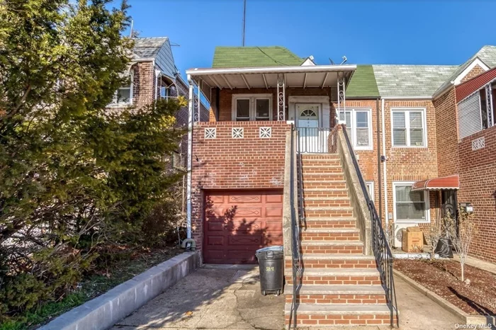 Located in Middle Village located close to shops and transportation this 2 family semi-detached brick home, features a 1st fl which has 3 rooms, 1 bedroom. 2nd fl has 4 rooms, 2 bedrooms, private yard, private driveway and 1 car garage in front. Home is in move in condition!