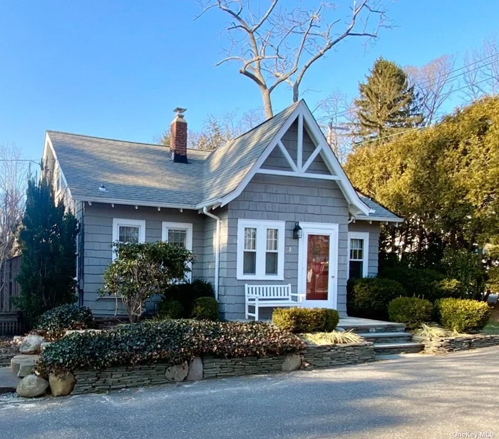 Move right in to this charming home with low taxes. Separate detached garage with walk up loft storage and new landscaping inspired by the Highline.