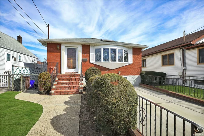 Wonderful home with : Large Living room, dining room combo, eat in kitchen, 3 nice sized bedrooms,  Large basement with 1/2 bath, den with fireplace , laundry and loads of storage. This is a diamond in the rough needing some TLC