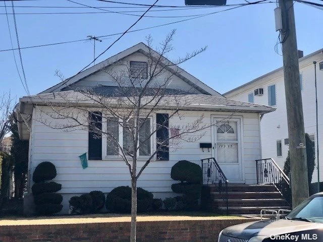 Detached One Family - Central location of Ozone Park, Close to schools, shopping, parks. 15 Min to Rockaway Beach. Private driveway with 2 car garage, lovely fenced yard. House has great potential! 3 Bedrooms, Living Room, FDR, Eik full basement with OSE.