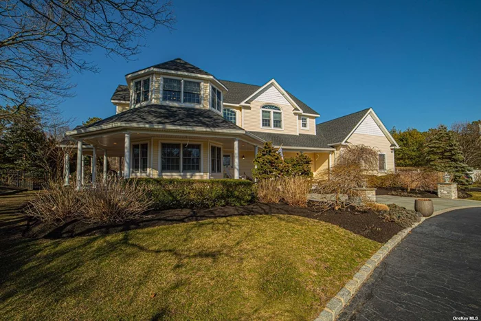 Dont miss this Magnificent Victorian w/Wrap Around Mahogany Porch. There are 5 Bdrms 3 Full Baths and 2 1/2 bths. As You Enter This Home, You Find Yourself In A Stunning Foyer w/Cathedral Ceilings and Beautiful Detailed Crown Molding. Wood Flrs thru out. ( Central Vac) Owner Spared No Expense. This Home Boasts of 4, 200 Sq Ft Of Living Space Plus 2, 000 Sq Ft Fin Basement with Theatre room- Soundproof Music Studio/ Gym/Rec Room w/ OSE. There Is A Huge Resort like Back Yard w/ IG Pool and Pool House. There is An Outside Kit and Wonderful Outdoor Fireplace For Those Chilly Nights. Great for entertaining. Fabulous Landscaping Surrounds The Home w/Outdoor Lighting. This home is also perfect for The Auto Collector. There is a 2 car garage plus a second detached car garage w lift that holds 4 cars. A MUST SEE!!!