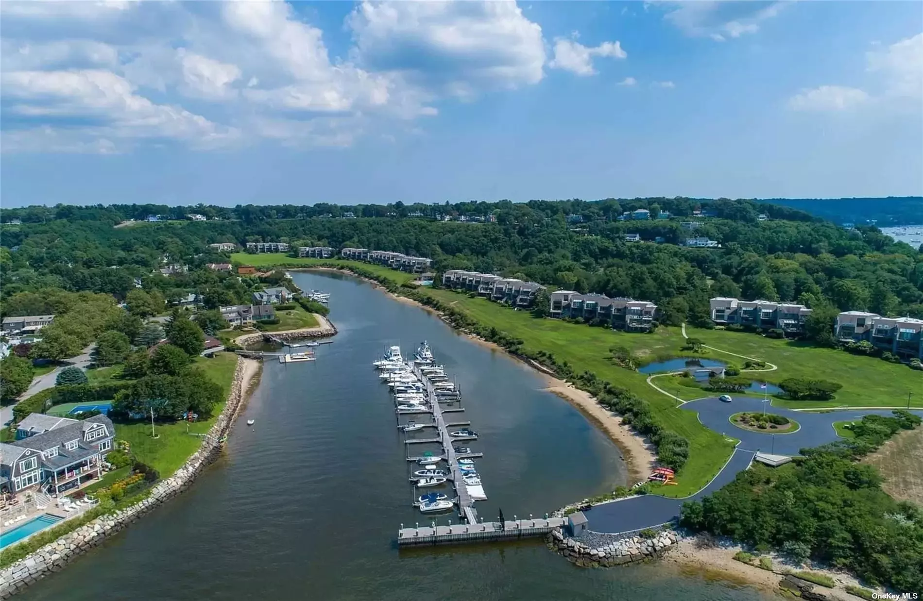 End unit townhouse in luxury, gated, waterfront community. Stunning views from every level. Open and airy floorplan. Pool, tennis and clubhouse. Close to Northport Village. Pets permitted on a case by case basis for an additional fee.