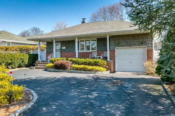 Welcome home to this beautifully maintained Ranch on an over-sized park-like property. This home features gleaming hardwood floors, wood burning fireplace, open concept living space w/ a granite & SS kitchen w/ skylight & family room. Offers ample storage w/ a full attic, finished bsmnt w/ OSE, attached garage w/ circular driveway