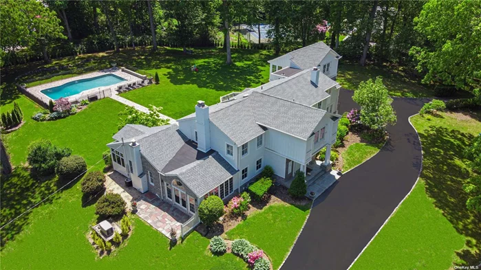 Majestically Located On The North Shore Of Long Island In A Prestigious Gold Coast Village, This Completely Renovated Elegant and Spacious Center Hall Colonial Home Is Set On 2.2 Acres Of Park-Like Grounds. Stone And Shake Exterior Meet Impeccable, Custom Details, With An Array of Gracious Sunlit Spaces. Perfect Living For All Whether You&rsquo;re Entertaining Al Fresco On The Vista Grounds, Soaking In The Tranquility. As You Relax By The In-Ground Pool, Enjoying A Home Cooked Meal In The Chef&rsquo;s Kitchen, Or Getting Cozy By One of Three Fireplaces. Unwind After Your Day As You Revel in Seclusion In The Master Suite Or Finished Basement. All Supported By a Full House Generator.