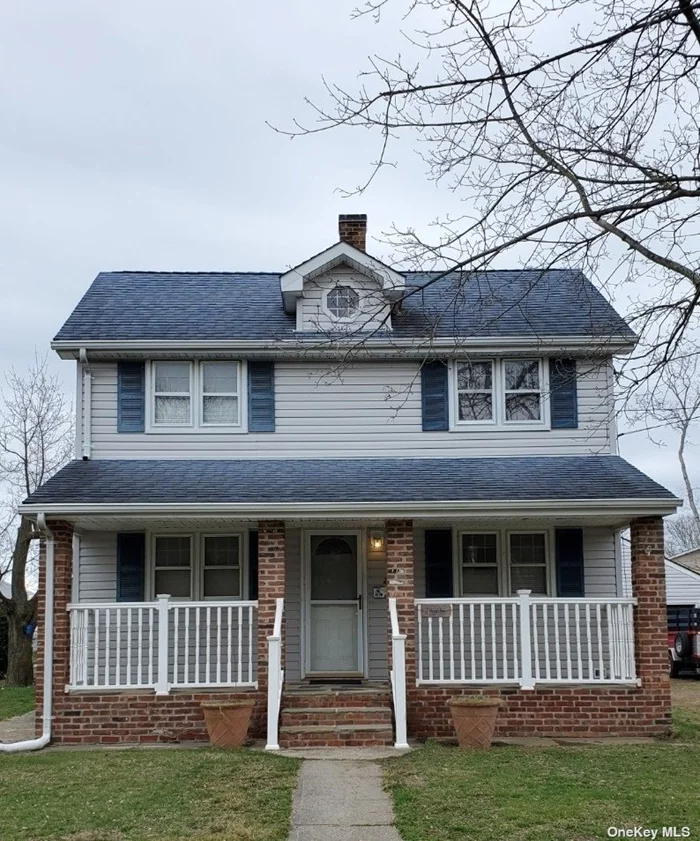 With a little TLC, make this great colonial the home of your dreams! Beautiful front porch! 8 car driveway + 2 car detached garage. Huge yard. Possible subdivision. Islip schools.