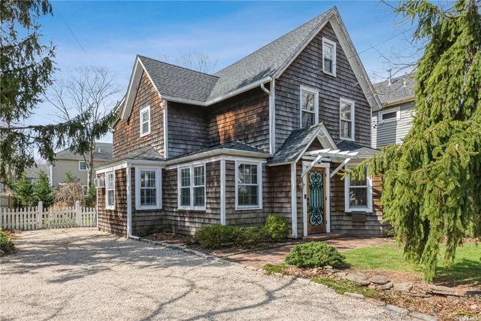 Located in beautiful Old Woodmere, this restored Colonial is a unique home to see! The lot size is 70x120 with plenty of room to expand this home. New Kitchen with GE appliances with natural gas cooking , a Kraus stainless farm sink and an eat in area with a granite overhang countertop. The interior of this homes features wide plank hardwood floors , white oak floors , original solid wood doors, oak banister, and original brass fixtures. Your second floor welcomes you with 3 bedrooms and new bathrooms. Each room has optimal closet space. Plenty of storage in the attic. The roof is 8 years young. Beautiful apple tree and plenty of room for your gardening. Close to all! SD#14 Taxes never grieved. No Flood Zone ! Warm and Inviting!