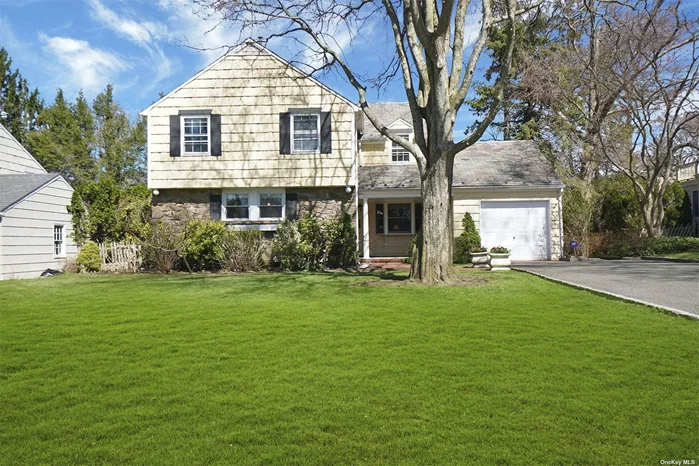 Charming 3 bedroom Colonial nestled on a quiet street in the heart of Salem. The sun-filled home offers an open floor planning featuring living room with fireplace, formal dining room, eat-in kitchen, family room with vaulted ceiling accessing beautiful brick patio and spacious flat yard. An inviting porch welcomes you to this lovely home. Convenient to town, train and schools.