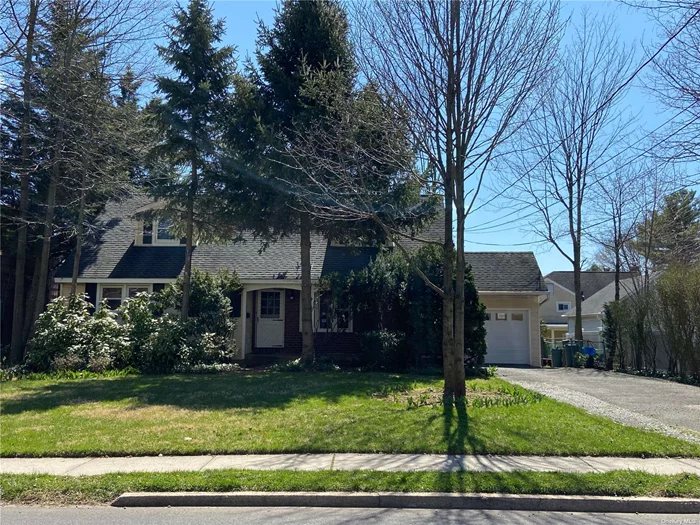 4br 2 bath Spacious home in Roslyn Heights. First floor features 2 Brs, Full bath, Formal living room, Den, Kitchen and nice hardwood floors. 2nd floor features 2 Bedrooms,  1 full bath and open space for playroom or office. This home is on a flat piece of property with a nice back yard. There is a full basement and attached garage.