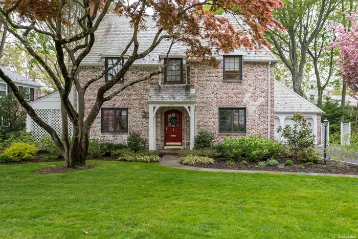 Classic Brick Center Hall Colonial in the heart of Munsey Park. Beautiful curb appeal with fine architectural details. Updated kitchen w/adjoining family room looking out to bluestone patio and beautifully landscaped yard. Close to Munsey Park school, field and playground. Walk to Americana Shopping Center and public transportation.