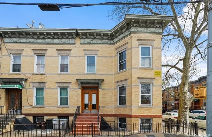 SEMI DETACHED BRICK CORNER 2 FAMILY WITH RARE 2 CAR GARAGE, HARDWOOD FLOORS, 3 BEDROOMS OVER 2 BEDROOMS, FULL BASEMENT AND FULLY VACANT , NEAR TRAIN TO MANHATTAN AND 1 BLOCK FROM STORES AND TRANSPORTATION ON MYRTLE AVE