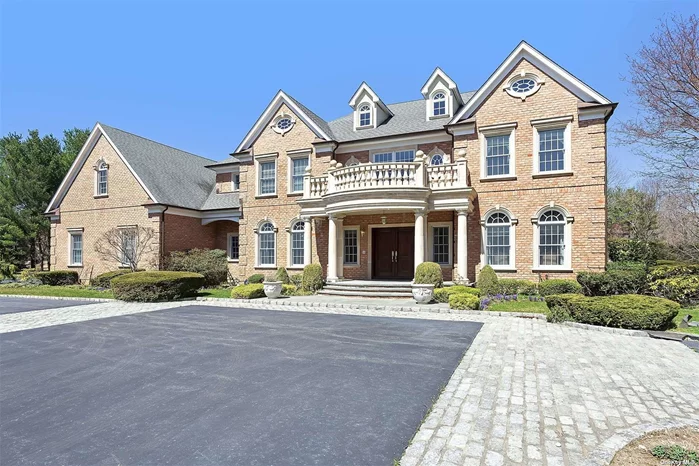 This magnificent custom brick colonial on a quiet block, built in 2003 with Generator, the house has 7, 120 square foot, with features of Dramatic architectural details & extensive decorative moldings. Eat-in Gourmet Kitchen w/ Excellent Appliances, Living Rm, Family Rm, Library, 5 bedrooms & 5.5 bathroom, master suite w/ large sitting Rm. In-ground Pool with pool house, the back yard has Charming Details landscaping with large porch, which offers incredible indoor and outdoor entertainment on 2 acres of land in Syosset. Close to King Kullen, Christina&rsquo;s Epicure, & Restaurants. Easy access to major road. Incredible opportunity to own your dream home. Will not last!