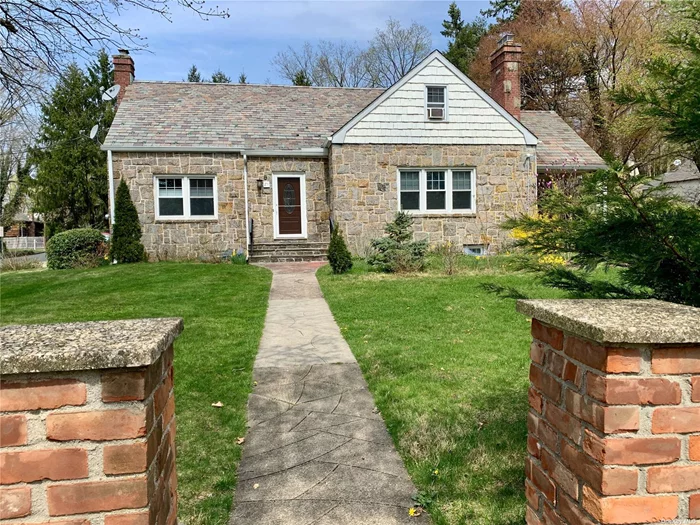 Original Custom Builder&rsquo;s Home, A Unique Fieldstone/Brick 2 Family on Large Lot. 1st Flr Front Entry w/Lovely Foyer, Archways. Oversized Living Room w/FP And Formal Dining Rm. New Kitchen w/Quartz Countertops and Subway Tile Backsplash. Hardwood Floors, Built ins, Classic Architectural Details Abound. Updated Electric, New Windows, Huge Basement, Partially finished w/FP- Great Media Room/Rec Room, etc & Unfinished Part w/STORAGE, Laundry, Workbench, Outside Entrance (Carpenter&rsquo;s Dream)! . Outside Boasts Specimen Planting, 3 Patios, Breezeway from Garage to First FL. Also, 2 Car Garage with full 2nd Flr Attic Storage. 2nd Flr Apt has EIK, LR, 2 Brs, F Bath, Roof Deck. Storage. 2 Blocks from RR; Near Shopping, Dining, Universities.