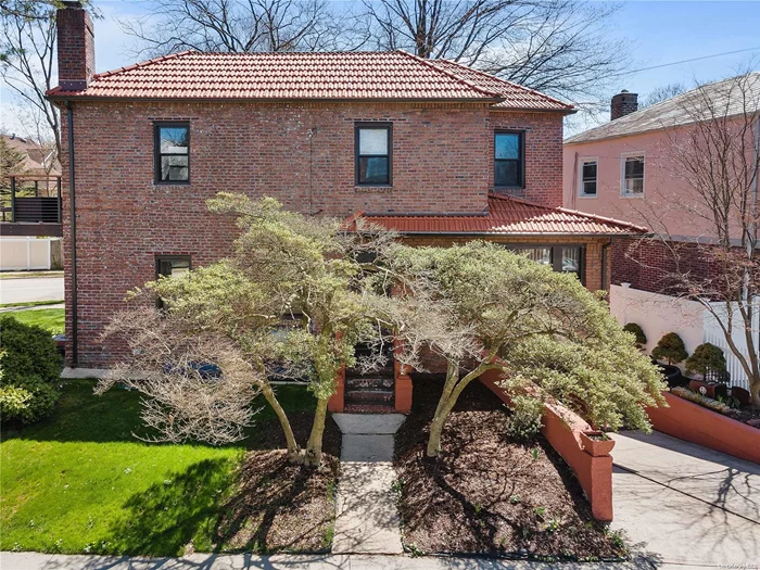 Welcome to Jamaica Estates !!! Charming 4 bedrooms 2.5 bath fully renovated home. First floor offers Renovated kitchen 1/2 bath, fireplace , Living/Dining room, 1 bedroom. Second floor offers 3 bedrooms 1 full bath with Jacuzzi. Main bedroom leads out to a balcony overlooking tree lined streets. Finished basement with high ceilings full bath, new boiler, open room & garage access. Centrally located close to shopping Transportation Cunningham Park, Express & local buses , Banks, schools, Library and house of worships. District 26!!!