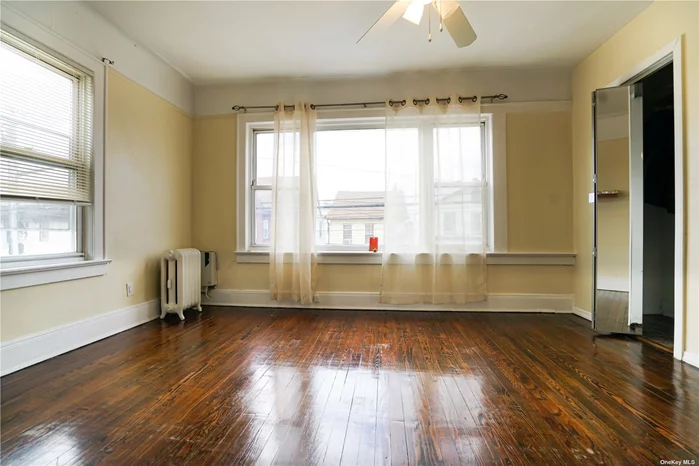 Oversize Sun-Drenched 2FL Apartment of 900 sqft. Features hardwood floors throughout, Large Eat-In Kitchen, you can fit a dining table in it. Bedrooms can fit kingsize bed and queens size bed.