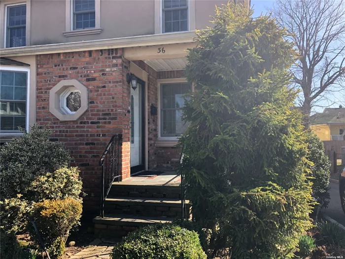 Updated 1st Floor Apartment, Super Location, Large Bedrooms with Updated Kitchen, Granite Countertops, Full Finished Basement, Driveway, & Backyard in Roslyn School District.