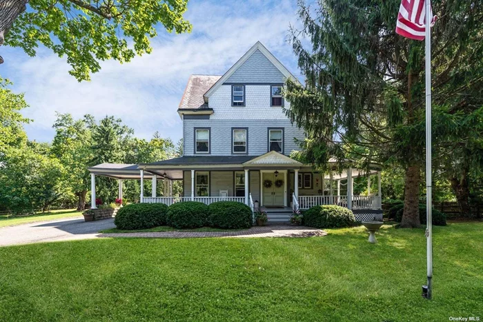 A Taste of History in this 1893 Victorian Home. Wrap Around Porch, Original Airtight Wood Stove in Sunroom and Restored Original Master Tub with Claw Feet Add To The Old World Charm. Stroll the 1.51 Acres Property & Think of Yesteryear. The Home Offers 2 Fireplaces, Wood Floors Throughout, Butlers Pantry, Plus Original Cooking Stove and Updated Appliances. Kitchen with 3 Sinks,  Decorative Trim Work, Mature Trees and Large In-Ground Pool. Close to Private Beaches, Golf & LIRR.