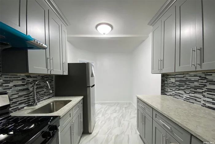 Brand New Renovated Large 2 BR Unit, About 1100sqft, On The 2th FL, Very Bright, Wood Floor Through-Out. 4 Blocks To Main ST, Close To Shops, Transportation & Supermarket, Convenient To All. Laundry Rm In Basement, Building Great-Maintained. Indoor Parking (131.25/ Per Month) And Outdoor Parking (106.25/Per Month).