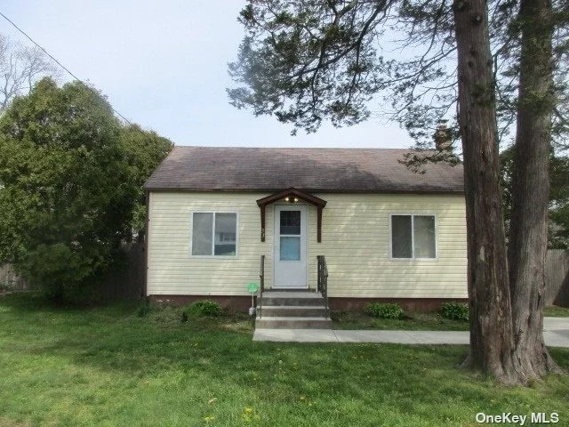 Low taxes. Freshly painted. Move in ready. Adorable 2 bedroom ranch .Living room and dining room offer vaulted ceilings . Great starter or downsizer home. Short distance to Smith Point Beach and marina.