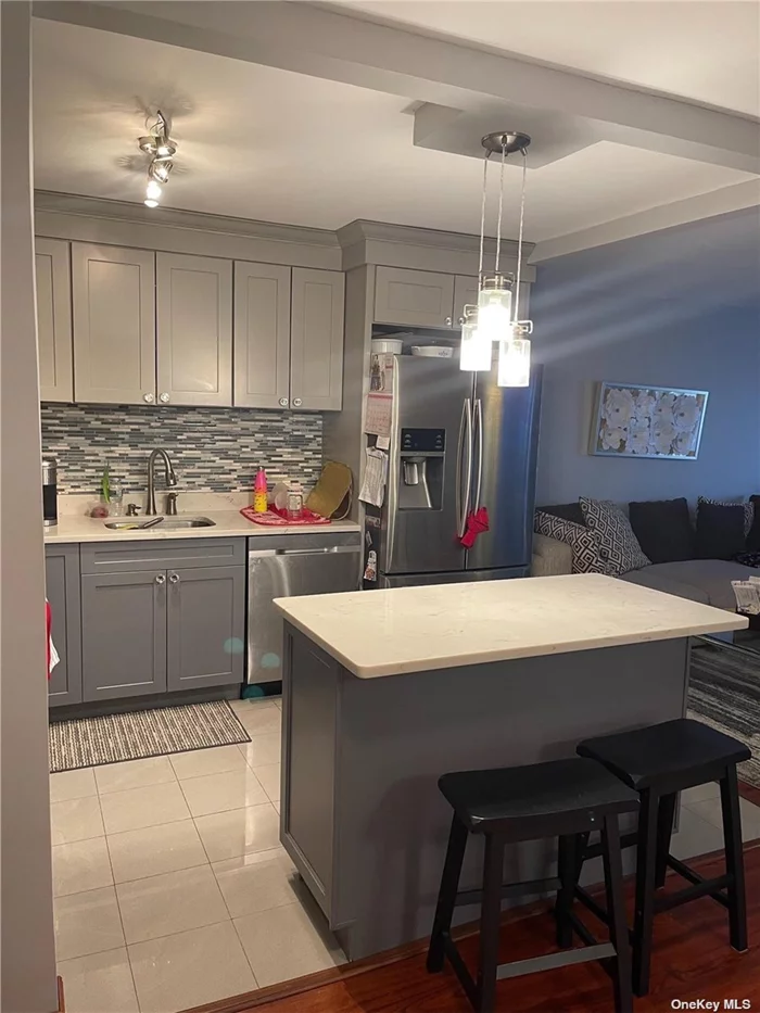 Beautiful renovated 1 bedroom with unbelievable water views of the sound... Open concept kitchen with SS appliances... large island... hardwoods throughout... balcony overlooking Long Island sound... doorman...24 hour security... rent includes all utilities