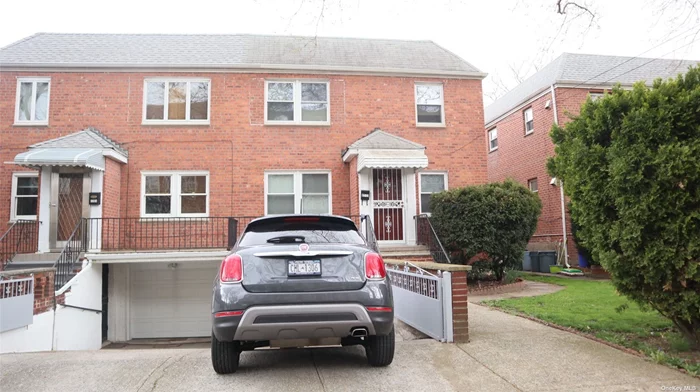 Well Kept Solid Brick Semi Attached Two Family Feature 1st Fl: Living Rm, Dining Rm, Kit, 3 Brs, 1, 5 Baths & 2nd Fl: Living Rm, Dining Rm, Kit, 3 Brs, 1, 5 Baths + Finished Basement With Bath & Sep/Ent. Excellent Investment Property. Good School Dist #26. Over Sized 3440 Sqft Property With 1 Car Garage. Walk To Shops , Schools & Bus.