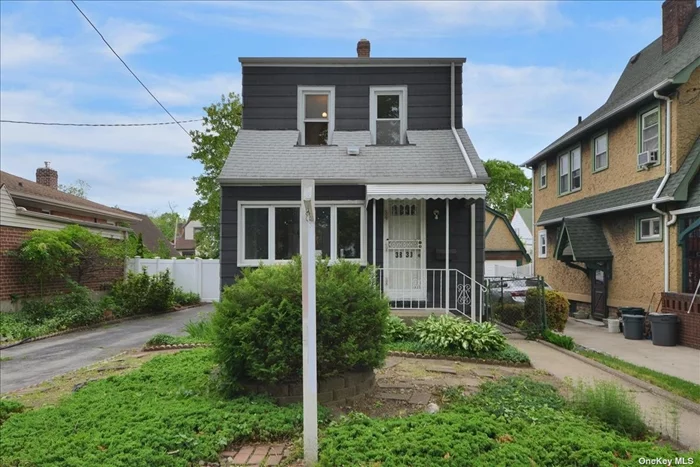 Charming, Clean, and Cozy Colonial in Prime Bayside. The First Floor Offers a Foyer, Living Room, Formal Dining Room, and an Oversized Eat-In Kitchen. Two Large Bedrooms and a Full Bathroom on the Second Floor. Finished Basement with Half Bath, Den, and Laundry. Updated Gas Heat, Windows, and Eastern Exposure. Needs Minor TLC.