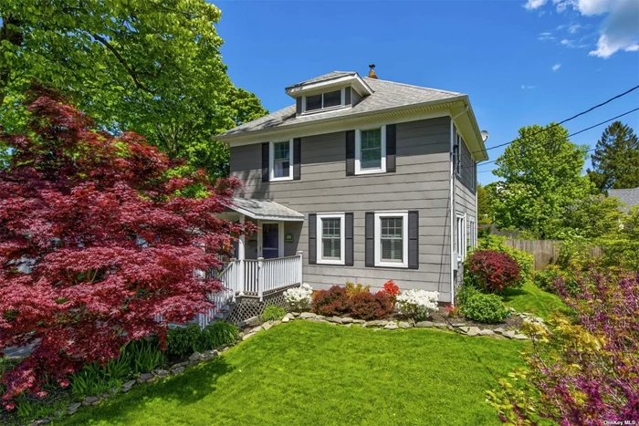 Totally renovated 4 bedroom and 1.5 bath colonial on .20 acre of beautiful flat fenced property, driveway to 2 car detached garage with 220 AMP service, new roof and universal Level 2 car charger, and IGS. 1st floor consists of a cozy living room with ample natural light, wood floors, and built in shelves. Eat in kitchen with terracotta tiles, granite countertops, cherry cabinets, all newer appliances, ample counter space and powder room. Spacious formal dining room with French doors to charming TimberTech back deck and yard. 2nd floor includes master bedroom with spacious closet, 3 additional bedrooms, and a full bath renovated in Feb 2021. Full basement with new windows, used for storage, laundry, utilities, and play space. Andersen windows throughout, cesspool replaced 2015, new Bosch gas tankless boiler. A short 10 minute walk to the train station.1 mile to restaurants, shops, and entertainment of downtown Huntington Village. Everything great about Huntington without village taxes!