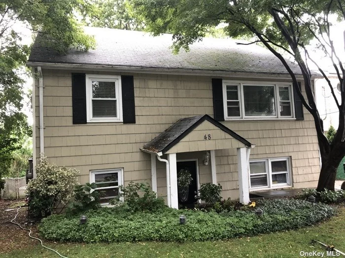 Spacious Colonial featuring 4 bedrooms, 2 full baths, living room w/fpl, dining room and eat-in kitchen. Tenant pays for landscaping.