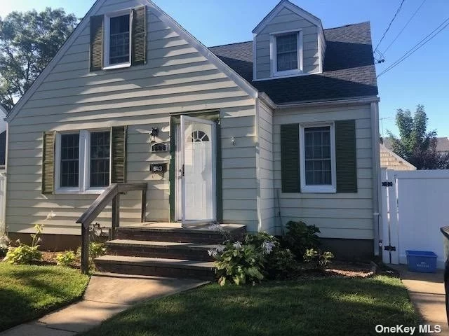 BEAUTIFUL CAPE FEATURES MASTER BEDROOM,  3 ADDITIONAL BEDROOMS, LR W/ FIREPLACE, DR, EIK, FULL BATH, 2 CAR DETACHED GARAGE, AND FULL FINISHED BASEMENT W BATHROOM AND / OSE! ROCKVILLE CENTRE BORDER! LOCATION, LOCATION, LOCATION! CLOSE TO SHOPPING AND TRANSPORTATION! TOO MUCH TO LIST! A MUST SEE!