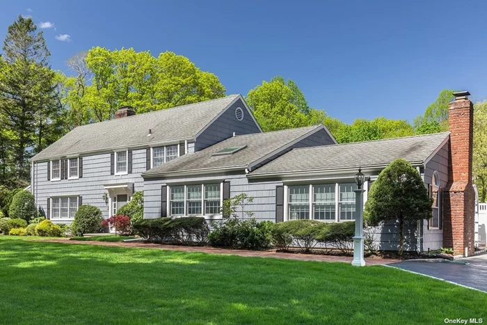 Absolutely stunning 4, 700 sq ft, 5 bed, 3.5 bath colonial, sitting on a perfectly manicured & flat 2.7 park like acres, in the highly desirable village of Laurel Hollow. Completely redone in 2016/2017 this home has been meticulously maintained both indoors & out. Featuring an in ground heated gunite pool, w/ beautiful brick patio, 3 car detached garage w/ base board heat, full house generator, & excessive amounts of storage this home leaves nothing to be desired. 1st floor features a large living room w/ fireplace, eat in kitchen w/ granite countertops, all high end stainless steal appliances including double wall oven, subzero fridge. Also, large formal dining room, den w/ fireplace, and sun room. Upper level includes an oversized master suite, w/ master bath, 3 additional bedrooms & full bath. Lower level includes outside backyard entrance, large family room w/ fireplace, powder room, & 5th bedroom with en suite bath. To much more to list. A must see!!