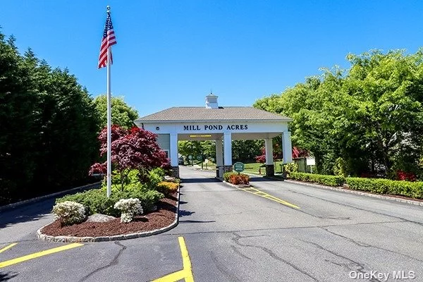 Sunny & Bright, this END, Cul de Sac Unit is a rare find. A delightful place to be in this beautifully landscaped Mill Pond Acres gated 55+ Community. This 2nd floor condo has it&rsquo;s own Private Entrance. Enter a large, Open Floor Plan with Living Room/Dining Room, Office Area & EIK with granite counter tops & backsplash. The Cathedral Ceilings & Skylights add to the cheerful feeling. There is a Master Br & en-suite bath, a 2nd Br w Sliding glass doors to private Terrace and a 2nd full Bathroom. Top it off with CAC, Central Vacuum, a Washer/Dryer and lots of closets. Enjoy the Clubhouse, Indoor heated pool/spa, gym, tennis, activities & social clubs, Jitney to stores & Train. Close to Port Washington Waterfront.