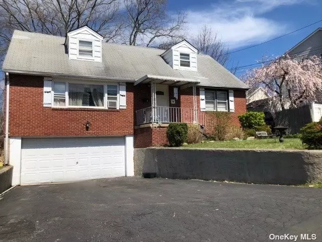 LEGAL 2-FAMILY situated on Large Lot in quiet Location. Attached 2-Car Garage & Private Parking for 6 Cars. First Fl: Lr/Dr, EIK opens to Patio & Deep Yard, 3 Bedrooms, Full Bath. Full Basement, Washer/Dryer, Half Bath. 2nd Fl: Lr, EIK, 3 Bedrooms, Full Bath. HW Floors as seen. Oil Heat & Water Paid by Owner. Electric Paid by Tenants (2) Meters. NO LEASES.