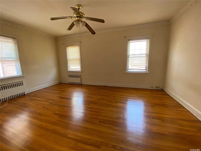 Spacious and Sunny 2nd Floor Apartment in Excellent Condition for Rent! LR, Dining Area, Kit, 1 Bdrm, 1 Bath. Beautiful Hardwood Floors Throughout! Very Convenient to Transportation, Shopping, Bell Blvd and LIRR (Bayside). Easy Street Parking!